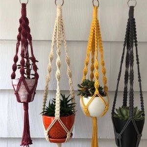 Macrame plant hangers They come in a variety of colours/styles/sizes.